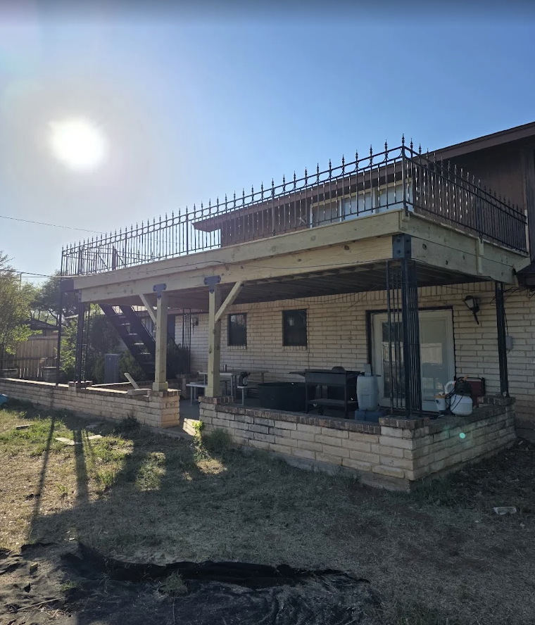 Deck and porch exterior work by Roe Construction